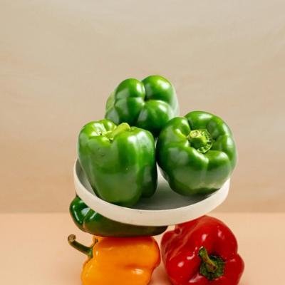Fresh Green Capsicum (250 gm)Delivery up to 15km radius from our location to your destination.